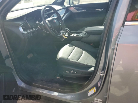 2023 Cadillac XT6 FWD Premium Luxury with VIN 1GYKPCRS0PZ231233, listed as a Copart auction lot 73210244 with 14,604 mi miles and Salvage Title. Bid and sale history available at carsss.com. Image 7.