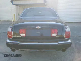 2001 Bentley Arnage with VIN SCBLC31E21CX05644, listed as a Copart auction lot 77706154 with 57,446 mi miles and Clean Title. Bid and sale history available at DreamBid. Image 6.