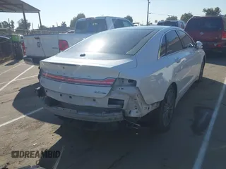2014 Lincoln MKZ с VIN 3LN6L2G98ER803773, выставлен на аукционе IAAI как лот 42750399 с пробегом 105 466 миль миль и . История ставок и продаж доступна на DreamBid. Изображение 4.
