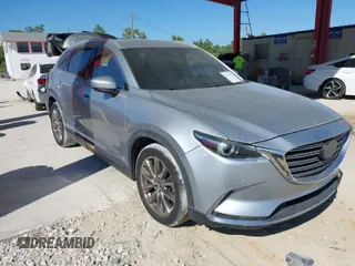 2018 Mazda CX-9 Grand Touring z VIN JM3TCADY2J0232117, wystawiony jako IAAI lot #41771179 z przebiegiem 191 847 mil mil oraz . Historia ofert i sprzedaży dostępna na DreamBid. Obrazek 1.