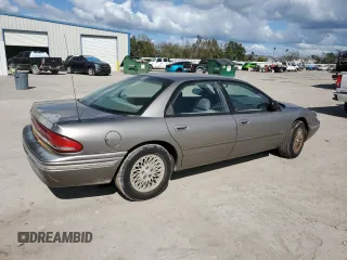 1996 Chrysler Concorde z VIN 2C3HD56T1TH140388, wystawiony jako Copart lot #79309424 z przebiegiem 97 957 mil mil oraz Szkody całkowita. Historia ofert i sprzedaży dostępna na DreamBid. Obrazek 3.