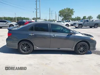 2011 Toyota Corolla L with VIN 2T1BU4EE8BC667772, listed as a IAAI auction lot 41960526 with 219,911 mi miles. Bid and sale history available at carsss.com. Image 14.