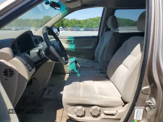 2004 Honda Odyssey LX with VIN 5FNRL18574B102634, listed as a Copart auction lot 54669075 with 141,057 mi miles and Salvage title. Bid and sale history available at DreamBid. Image 7.
