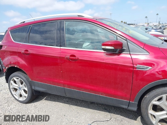 2019 Ford Escape Titanium with VIN 1FMCU0J96KUB79330, listed as a IAAI auction lot 42018346 with 35,500 mi miles and . Bid and sale history available at DreamBid. Image 14.