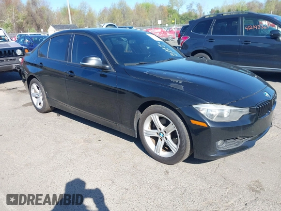 2013 BMW 3 Series 328i xDrive with VIN WBA3B5G53DNS04643, listed as a IAAI auction lot 42143365 with 107,448 mi miles. Bid and sale history available at carsss.com. Image 1.