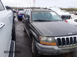 2000 Jeep Grand Cherokee Laredo with VIN 1J4GW48N2YC187623, listed as a IAAI auction lot 41311495 with 121,831 mi miles and . Bid and sale history available at DreamBid. Image 1.