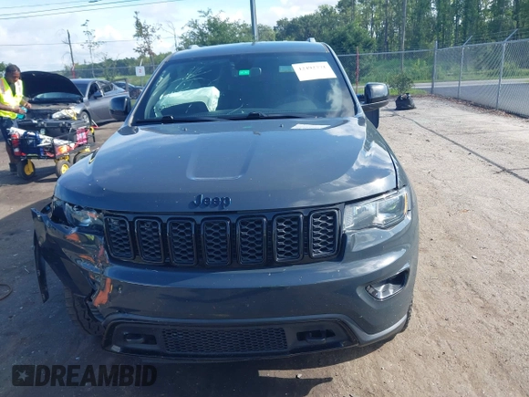 2018 Jeep Grand Cherokee Altitude with VIN 1C4RJFAG7JC394051, listed as a IAAI auction lot 42492771 with 147,669 mi miles and . Bid and sale history available at DreamBid. Image 12.