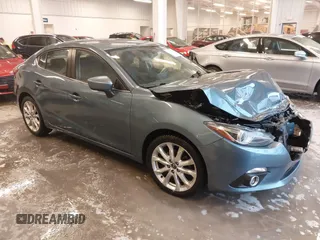 2014 Mazda 3 S Grand Touring with VIN JM1BM1W31E1182703, listed as a IAAI auction lot 41470742 with 123,956 mi miles and . Bid and sale history available at DreamBid. Image 1.