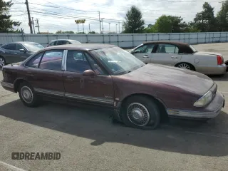 1992 Oldsmobile 88 z VIN 1G3HN53L6N1805364, wystawiony jako Copart lot #71710934 z przebiegiem 47 032 mil mil oraz Szkoda całkowita • Salvage title. Historia ofert i sprzedaży dostępna na DreamBid. Obrazek 4.