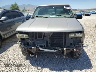 2000 Chevrolet Tahoe Z71 с VIN 1GNEK13R3YR116047, выставлен на аукционе Copart как лот 60037735 с пробегом 174 428 миль миль и Списание • Salvage title. История ставок и продаж доступна на DreamBid. Изображение 5.