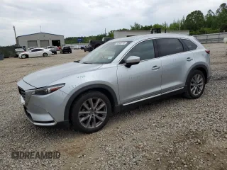 2021 Mazda CX-9 Carbon Edition z VIN JM3TCADY3M0517512, wystawiony jako Copart lot #54240715 z przebiegiem 89 599 mil mil oraz Szkoda całkowita • Salvage title. Historia ofert i sprzedaży dostępna na DreamBid. Obrazek 1.