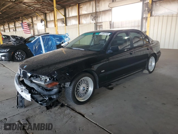 1999 BMW 5 Series 528iA with VIN WBADM6344XBY34517, listed as a Copart auction lot 51803145 with 186,637 mi miles and Salvage Title. Bid and sale history available at carsss.com. Image 1.