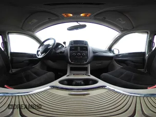 2014 Dodge Grand Caravan SXT with VIN 2C4RDGCG0ER417662, listed as a IAAI auction lot 41933279 with 156,751 mi miles and . Bid and sale history available at DreamBid. Image 21.