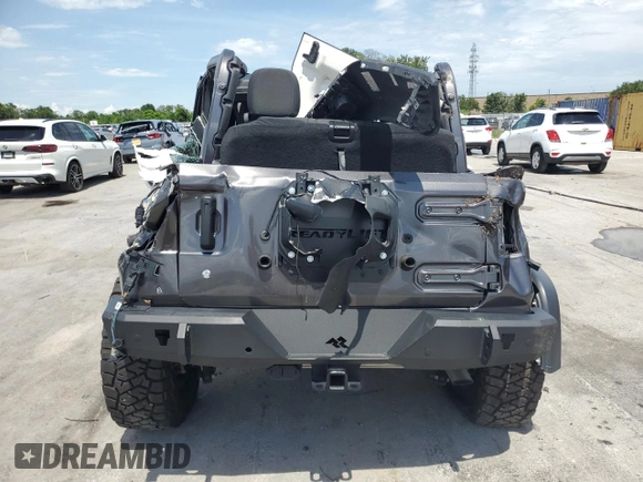 2019 Jeep Wrangler Sport S with VIN 1C4GJXAG4KW569059, listed as a Copart auction lot 60546945 with 57,131 mi miles and Non repairable. Bid and sale history available at DreamBid. Image 6.