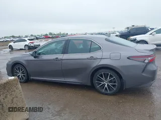 2023 Toyota Camry SE z VIN 4T1T11AK0PU084934, wystawiony jako IAAI lot #41962805 z przebiegiem 39 395 mil mil oraz . Historia ofert i sprzedaży dostępna na DreamBid. Obrazek 14.