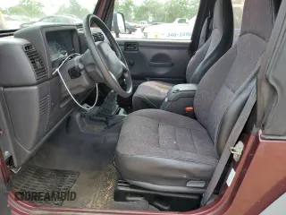 2002 Jeep Wrangler X z VIN 1J4FA39S42P773815, wystawiony jako Copart lot #60016255 z przebiegiem 174 803 mil mil oraz Szkoda całkowita • Salvage title. Historia ofert i sprzedaży dostępna na DreamBid. Obrazek 7.