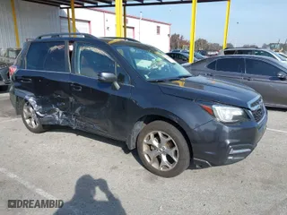 2018 Subaru Forester Touring with VIN JF2SJAWC7JH441559, listed as a IAAI auction lot 41599025 with 105,828 mi miles. Bid and sale history available at carsss.com. Image 1.