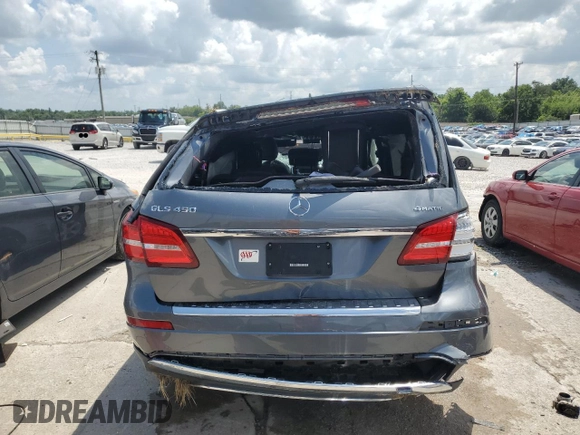 2018 Mercedes-Benz GLS 450 z VIN 4JGDF6EE1JB095130, wystawiony jako Copart lot #61386595 z przebiegiem 49 328 mil mil oraz Nie do naprawy • Non repairable. Historia ofert i sprzedaży dostępna na DreamBid. Obrazek 6.