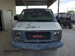 1998 GMC Savana z VIN 1GTEG15M7W1029632, wystawiony jako Copart lot #56106675 z przebiegiem Nie podano mil oraz Nie do naprawy. Historia ofert i sprzedaży dostępna na DreamBid. Obrazek 5.