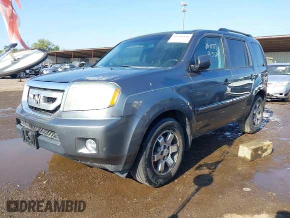 2010 Honda Pilot Touring with VIN 5FNYF3H87AB006023, listed as a IAAI auction lot 40310546 with 135,482 mi miles and . Bid and sale history available at carsss.com. Image 17.