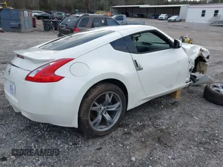2012 Nissan 370Z Touring with VIN JN1AZ4EH4CM565125, listed as a IAAI auction lot 41630602 with 121,823 mi miles. Bid and sale history available at carsss.com. Image 4.