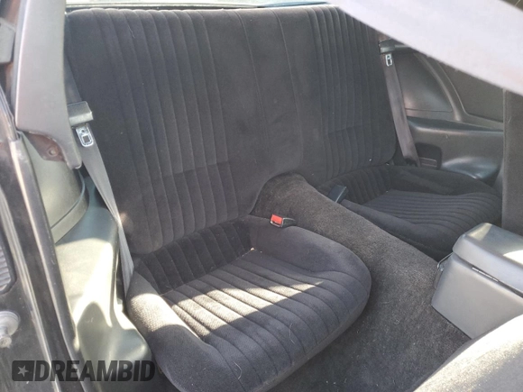 1989 Pontiac Firebird z VIN 1G2FS2186KL212458, wystawiony jako Copart lot #56995025 z przebiegiem 89 851 mil mil oraz Szkoda całkowita • Salvage title. Historia ofert i sprzedaży dostępna na DreamBid. Obrazek 10.