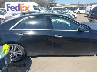 2014 Cadillac CTS Vsport Premium RWD z VIN 1G6AV5S81E0159352, wystawiony jako IAAI lot #41889600 z przebiegiem 94 859 mil mil oraz . Historia ofert i sprzedaży dostępna na DreamBid. Obrazek 13.