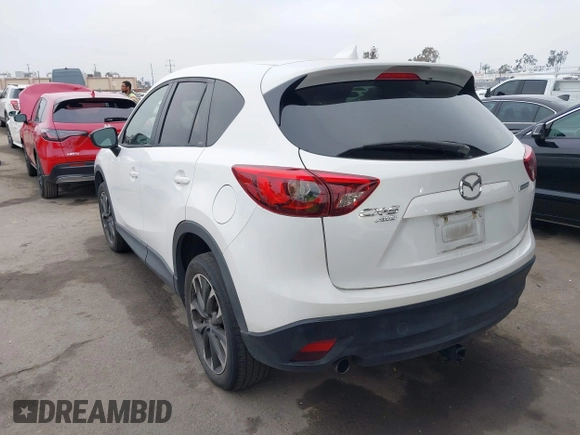 2016 Mazda CX-5 Grand Touring with VIN JM3KE4DY7G0737232, listed as a IAAI auction lot 42158279 with Not Provided miles and . Bid and sale history available at DreamBid. Image 3.