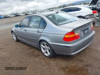 2005 BMW 3 Series 325i with VIN WBAET37485NJ91293, listed as a IAAI auction lot 41714734 with 170,996 mi miles. Bid and sale history available at carsss.com. Image 3.