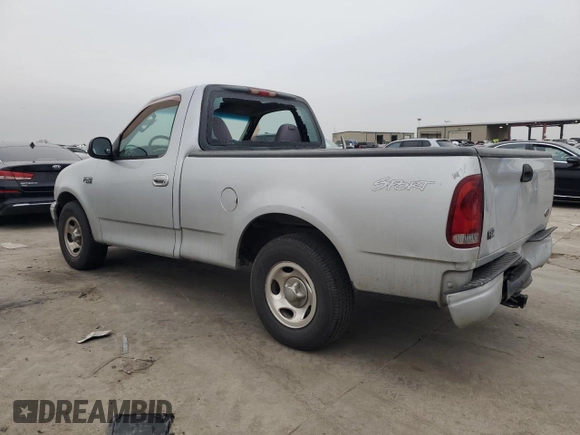 2002 Ford F-150 XL with VIN 1FTRF172X2NB77521, listed as a Copart auction lot 43993885 with 339,289 mi miles and Salvage Title. Bid and sale history available at carsss.com. Image 2.