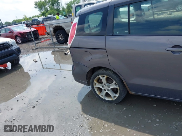 2010 Mazda 5 Sport with VIN JM1CR2W31A0375560, listed as a IAAI auction lot 42618380 with 171,910 mi miles and . Bid and sale history available at DreamBid. Image 12.