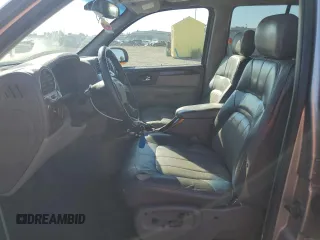 2002 GMC Envoy SLE with VIN 1GKDS13S822359901, listed as a Copart auction lot 71940774 with 188,580 mi miles and Salvage Title. Bid and sale history available at carsss.com. Image 7.