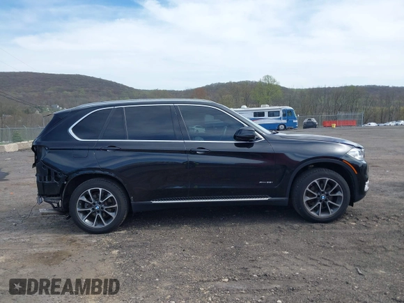 2017 BMW X5 xDrive35i with VIN 5UXKR0C31H0V78672, listed as a IAAI auction lot 42084958 with 95,782 mi miles and . Bid and sale history available at DreamBid. Image 14.