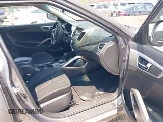 2014 Hyundai Veloster RE:FLEX с VIN KMHTC6AD7EU184390, выставлен на аукционе IAAI как лот 42652331 с пробегом 107 854 миль миль и . История ставок и продаж доступна на DreamBid. Изображение 5.