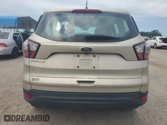 2017 Ford Escape S с VIN 1FMCU0F79HUD81952, выставлен на аукционе Copart как лот 57172565 с пробегом 133 860 миль миль и Списание • Salvage title. История ставок и продаж доступна на DreamBid. Изображение 6.