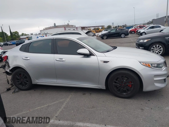 2018 Kia Optima S with VIN 5XXGT4L35JG216039, listed as a IAAI auction lot 42451216 with 91,679 mi miles and . Bid and sale history available at DreamBid. Image 13.