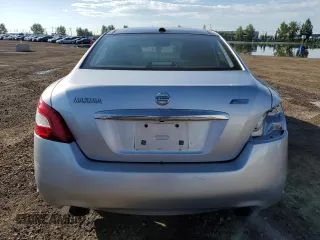 2010 Nissan Maxima SV with VIN 1N4AA5AP7AC871283, listed as a Copart auction lot 66394785 with 295,925 mi miles and Salvage title. Bid and sale history available at DreamBid. Image 6.