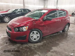 2014 Chevrolet Sonic LT with VIN 1G1JC6SHXE4212589, listed as a IAAI auction lot 41622549 with 63,135 mi miles. Bid and sale history available at carsss.com. Image 2.