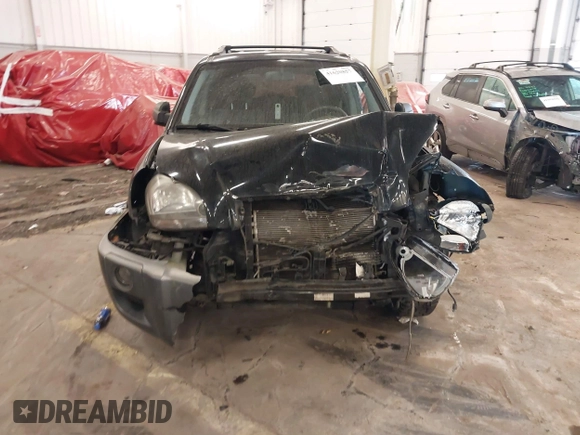 2007 Hyundai Tucson SE with VIN KM8JN72D47U670938, listed as a IAAI auction lot 41620857 with 129,769 mi miles and . Bid and sale history available at DreamBid. Image 6.