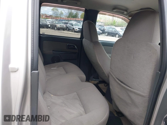2005 Chevrolet Colorado 1SF LS Z71 z VIN 1GCDT136158190415, wystawiony jako IAAI lot #42059101 z przebiegiem 208 634 mil mil oraz . Historia ofert i sprzedaży dostępna na DreamBid. Obrazek 8.