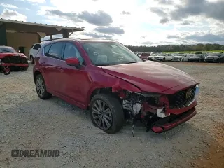 2023 Mazda CX-5 Signature with VIN JM3KFBXY4P0100652, listed as a Copart auction lot 82235664 with 29,344 mi miles and Salvage Title. Bid and sale history available at carsss.com. Image 11.