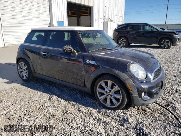 2013 MINI Hardtop S with VIN WMWSV3C52DT393181, listed as a Copart auction lot 50179065 with 66,655 mi miles and Salvage Title. Bid and sale history available at DreamBid. Image 4.