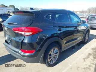 2017 Hyundai Tucson SE Plus with VIN KM8J33A49HU381233, listed as a IAAI auction lot 41393645 with 83,708 mi miles. Bid and sale history available at carsss.com. Image 4.