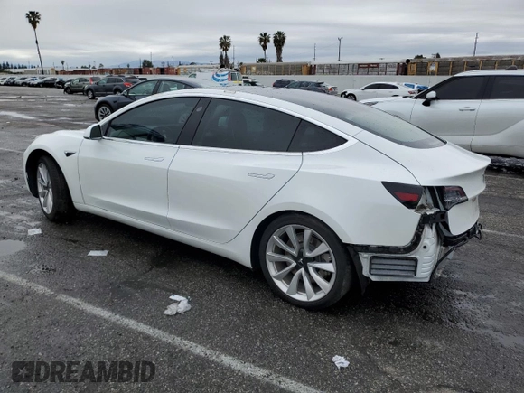 2019 Tesla Model 3 Mid Range z VIN 5YJ3E1EA3KF337854, wystawiony jako Copart lot #48472855 z przebiegiem 113 562 mil mil oraz Szkoda całkowita • Salvage title. Historia ofert i sprzedaży dostępna na DreamBid. Obrazek 2.