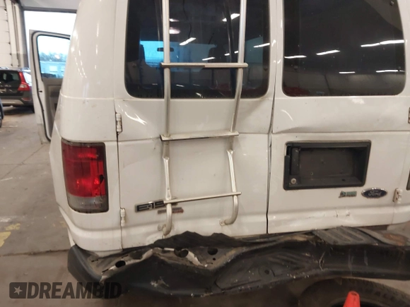 2011 Ford Econoline Cargo Commercial with VIN 1FTNE1EW5BDB01167, listed as a IAAI auction lot 41226859 with 248,606 mi miles and . Bid and sale history available at DreamBid. Image 18.