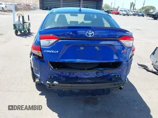 2022 Toyota Corolla SE with VIN JTDS4MCE4NJ099869, listed as a IAAI auction lot 41848244 with 24,357 mi miles and . Bid and sale history available at DreamBid. Image 6.
