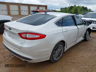 2015 Ford Fusion SE with VIN 3FA6P0HD9FR123677, listed as a IAAI auction lot 42021493 with 166,446 mi miles and . Bid and sale history available at DreamBid. Image 4.