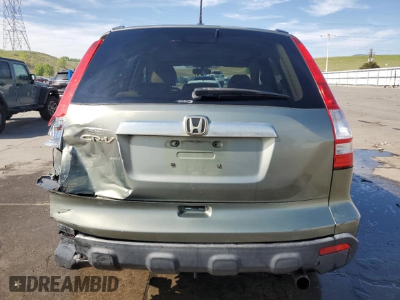 2007 Honda CR-V EX-L z VIN JHLRE48737C114362, wystawiony jako Copart lot #58256055 z przebiegiem 467 453 mil mil oraz Szkoda całkowita • Salvage title. Historia ofert i sprzedaży dostępna na DreamBid. Obrazek 6.