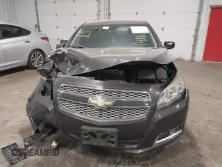 2013 Chevrolet Malibu LTZ with VIN 1G11H5SA1DF281933, listed as a IAAI auction lot 42114395 with 193,550 mi miles and . Bid and sale history available at DreamBid. Image 12.