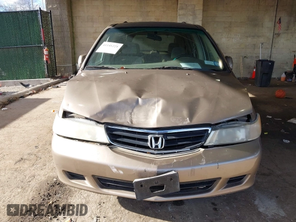 2004 Honda Odyssey EX-RES z VIN 5FNRL18874B127785, wystawiony jako IAAI lot #41141221 z przebiegiem 151 036 mil mil oraz . Historia ofert i sprzedaży dostępna na DreamBid. Obrazek 12.